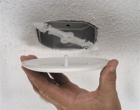 ceiling electric box cover blends in with ceiling|hide electrical wires in ceiling.